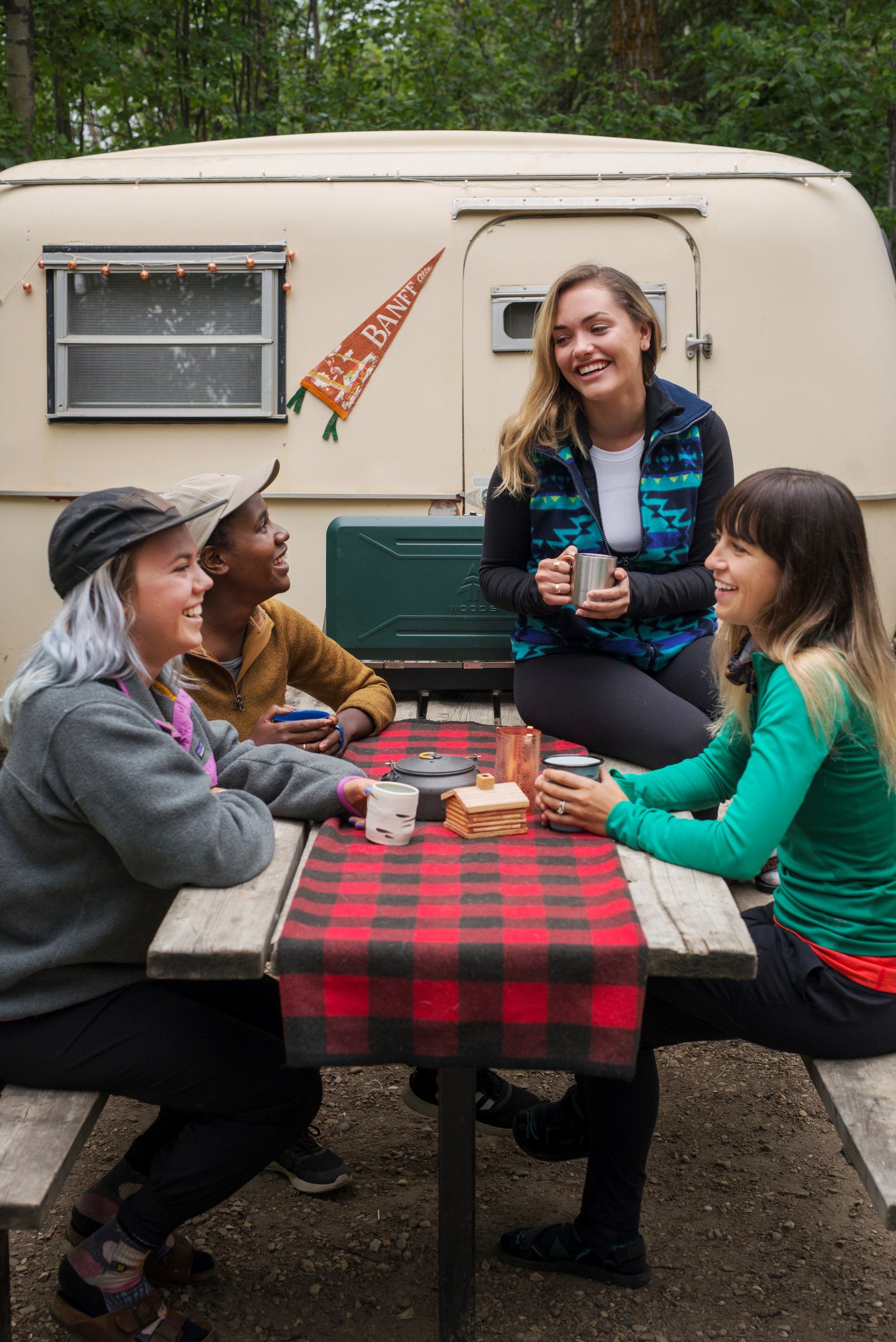 A group of people enjoying their time at the campground
