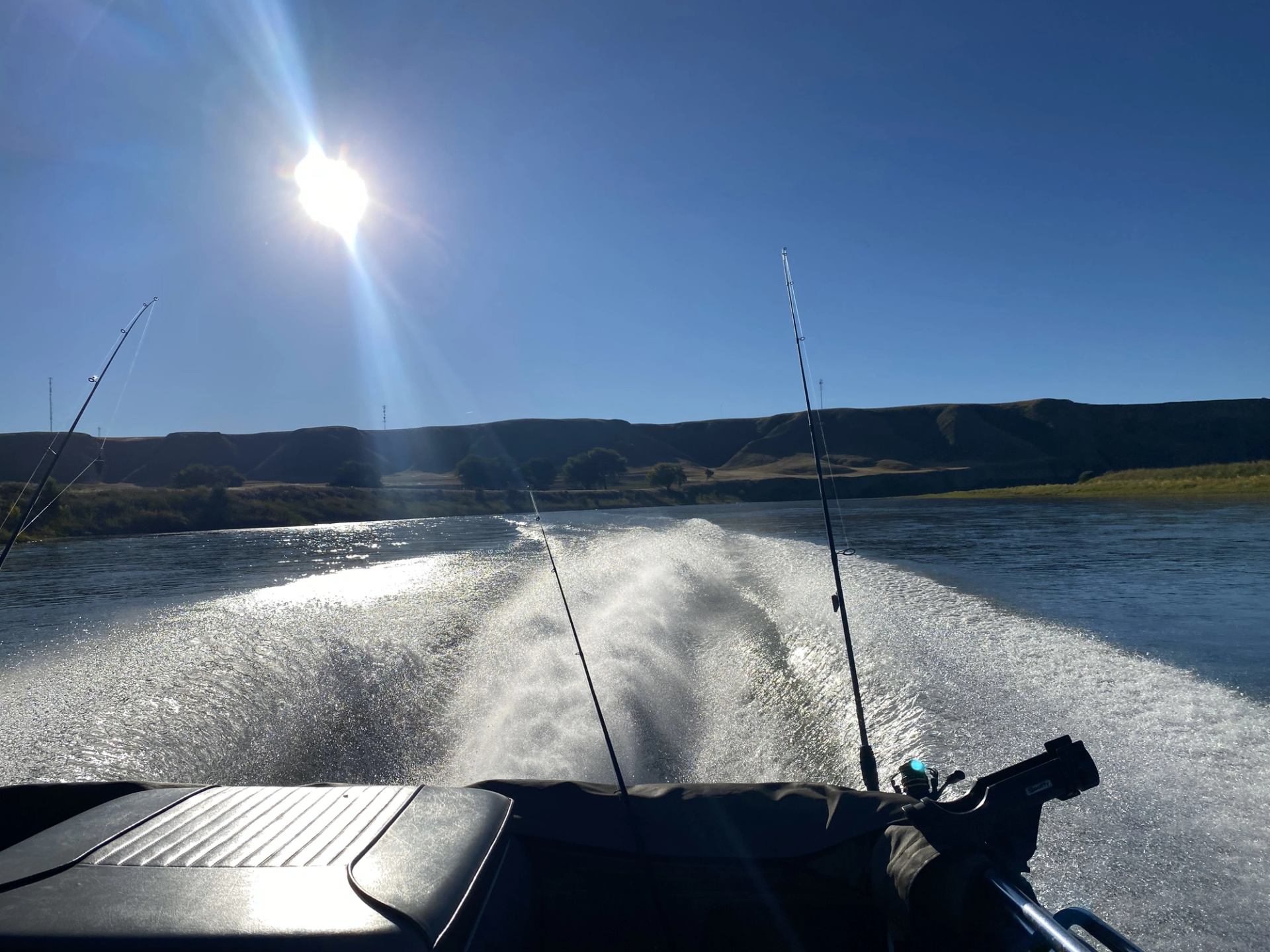A boat going through the water making waves