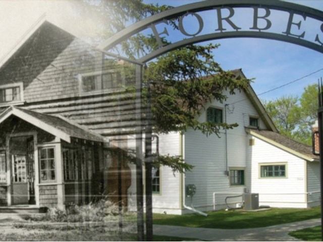 Historic and modern buildings side by side under archway labeled “FORBES.”