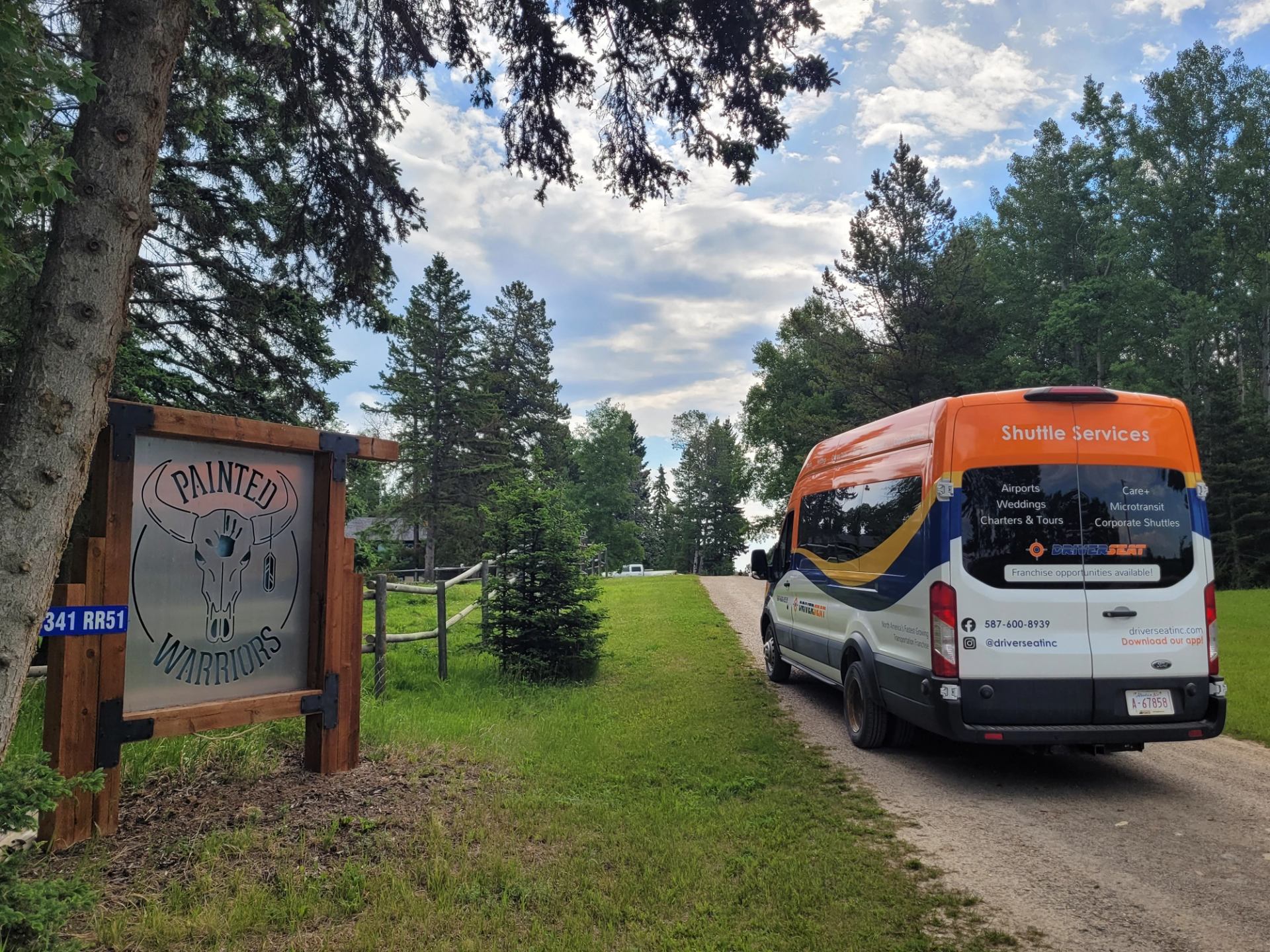 Shuttle van arriving at Painted Warriors Ranch.