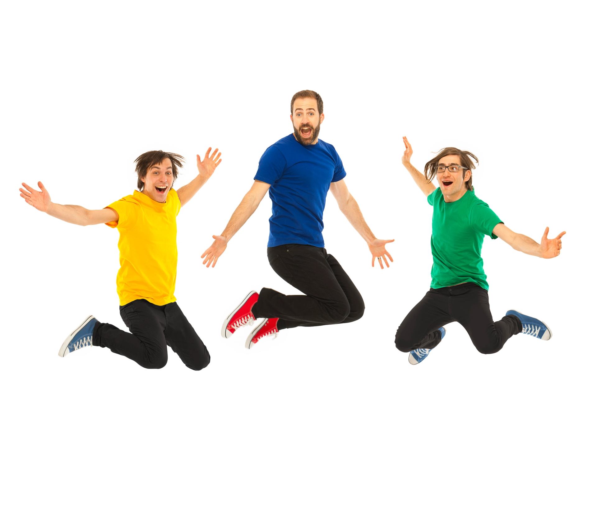 Three performers jumping in the air.