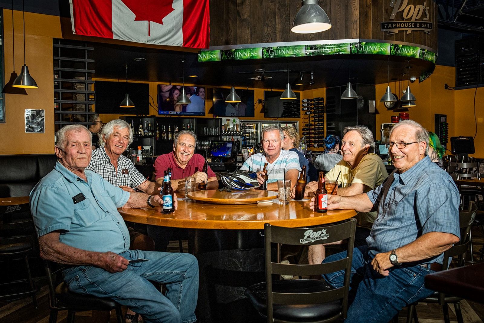 A group of people sat around a table