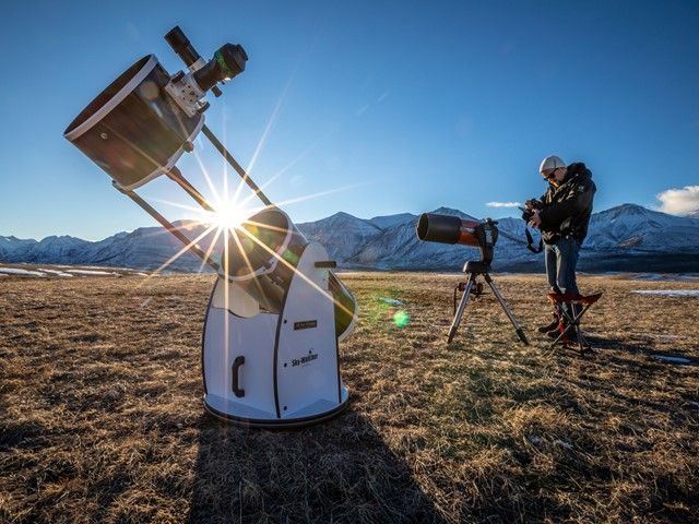 Dark Sky Guide with equipment in the field.