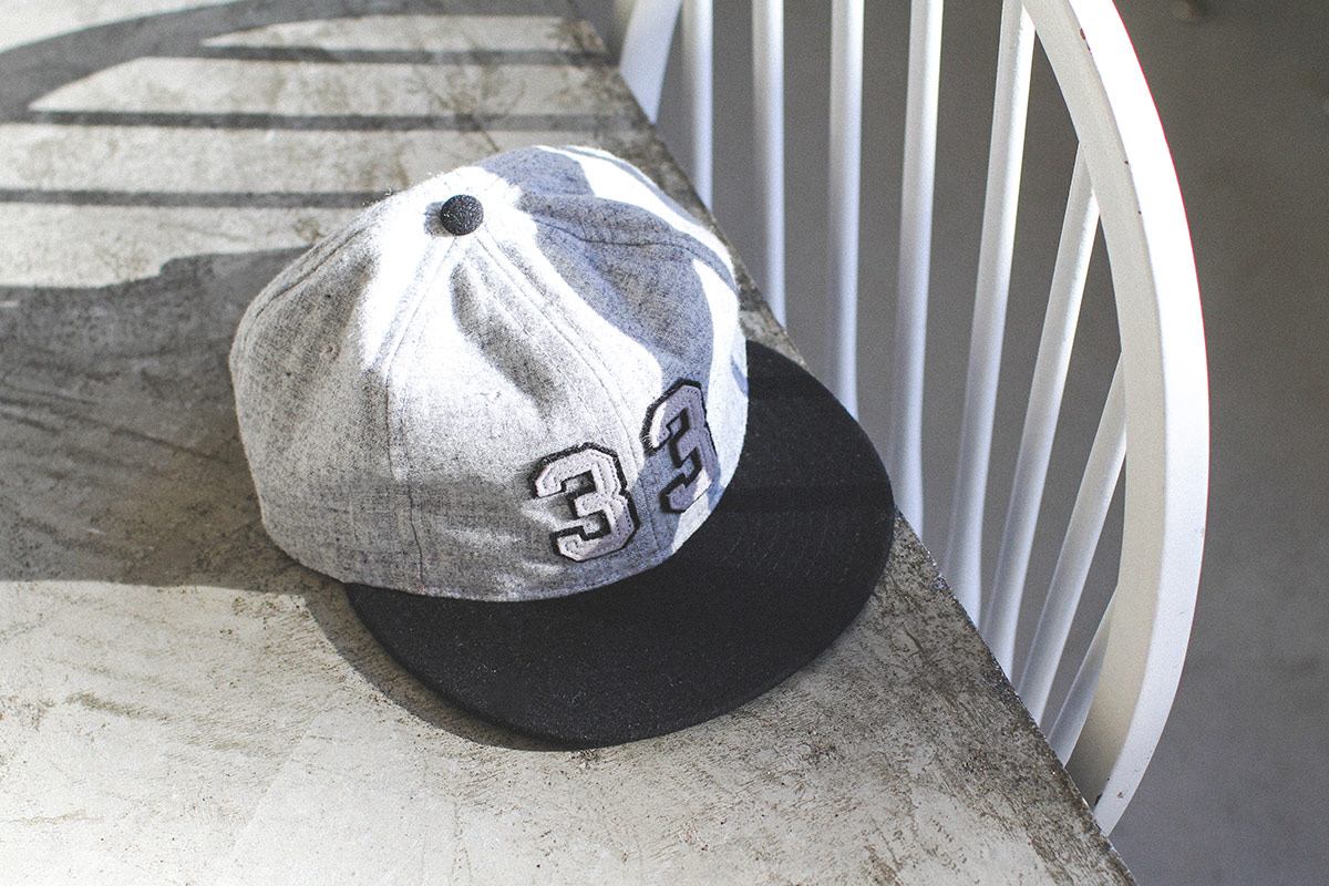 A 33 Acres baseball cap.