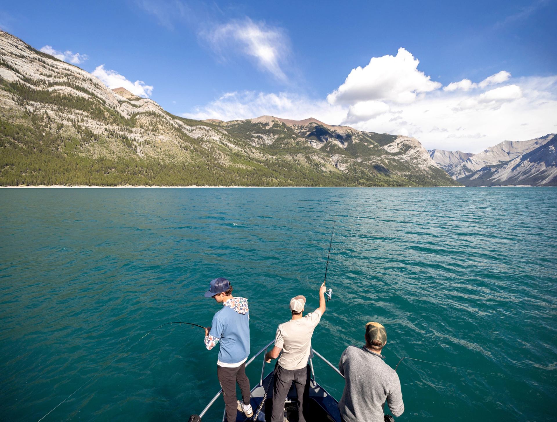 Guests Fishing off the Banff Fishing Boat on Lake Minnewanka