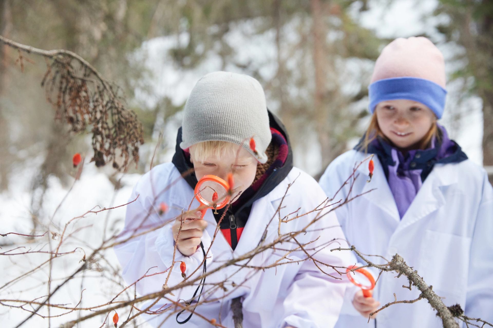 Science ice-walk with two children exploring nature with Uplift Adventures at Star Creek Falls 