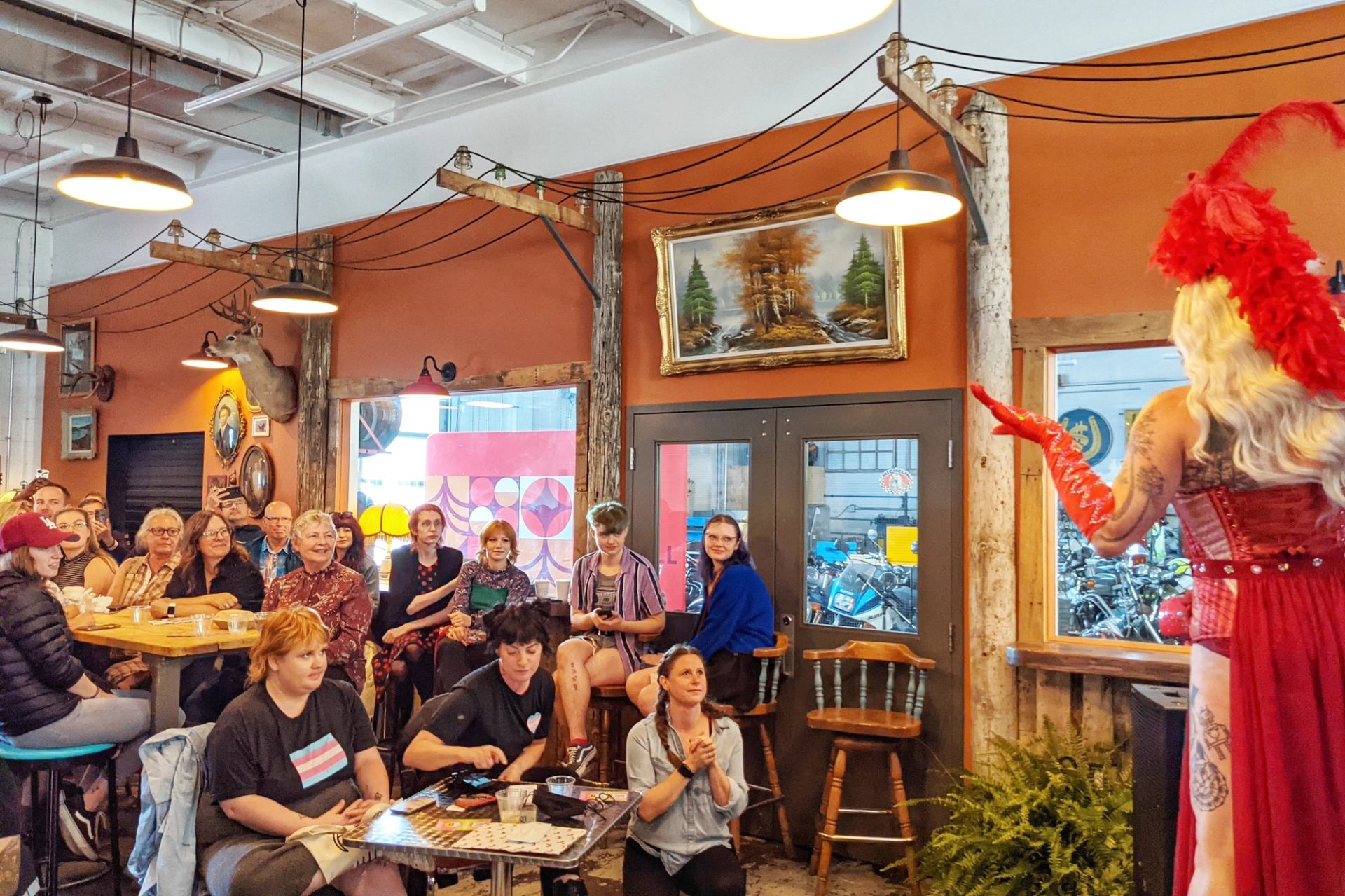 People seating in The Prairie Emporium watch a show