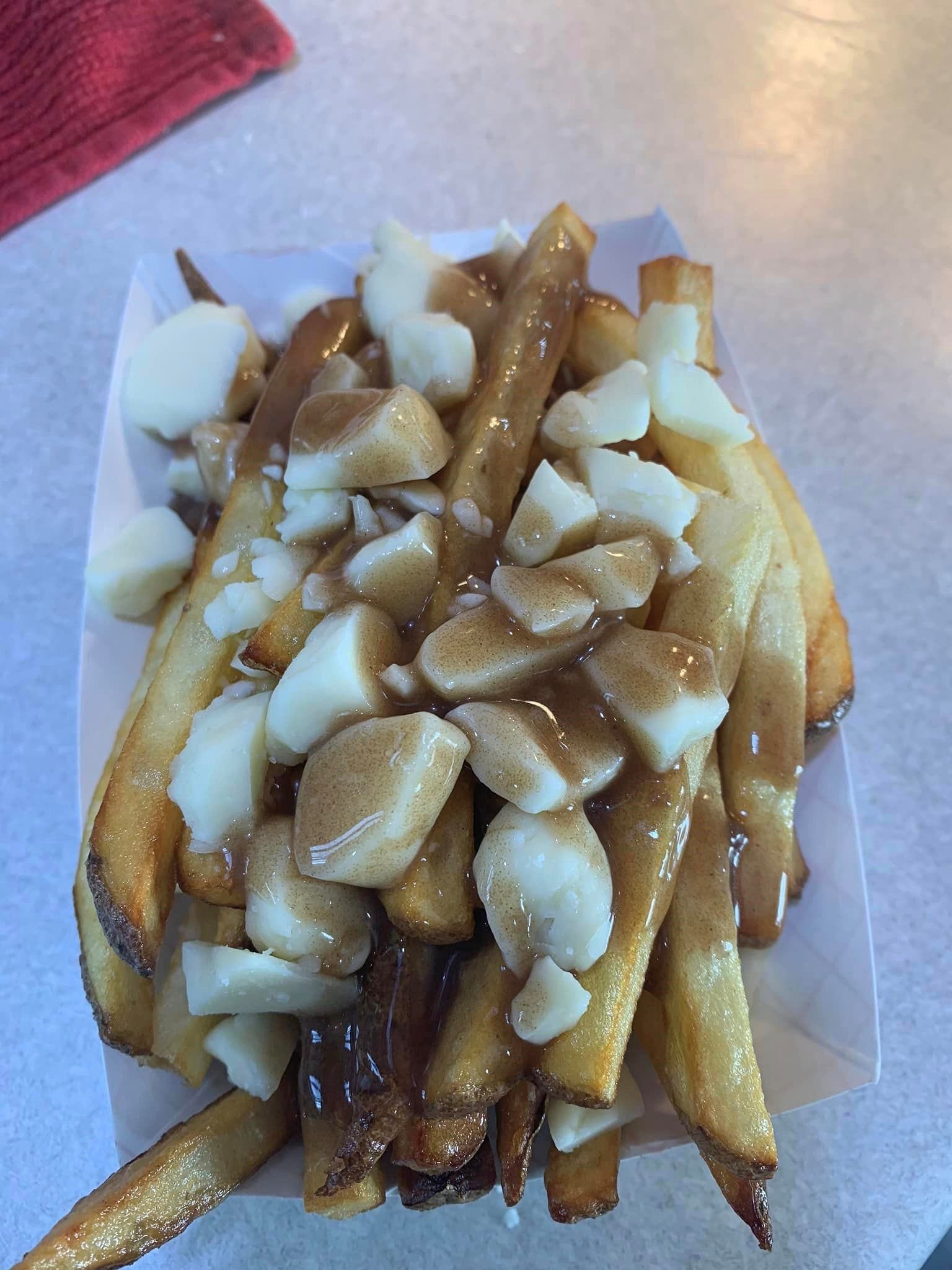 Golden fries topped with cheese curds and rich brown gravy.