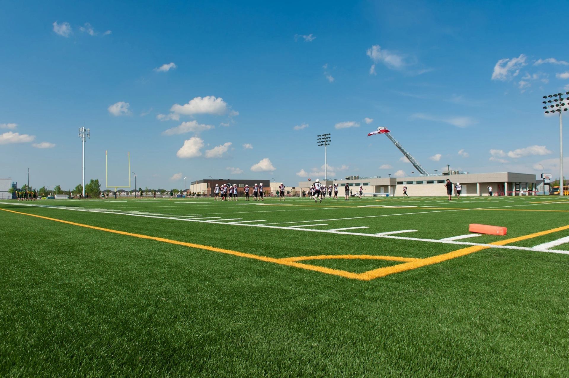 Kids playing football on Taurus Field