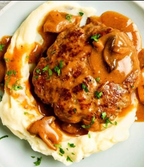 Salisbury steak with mashed potatoes and mushroom gravy