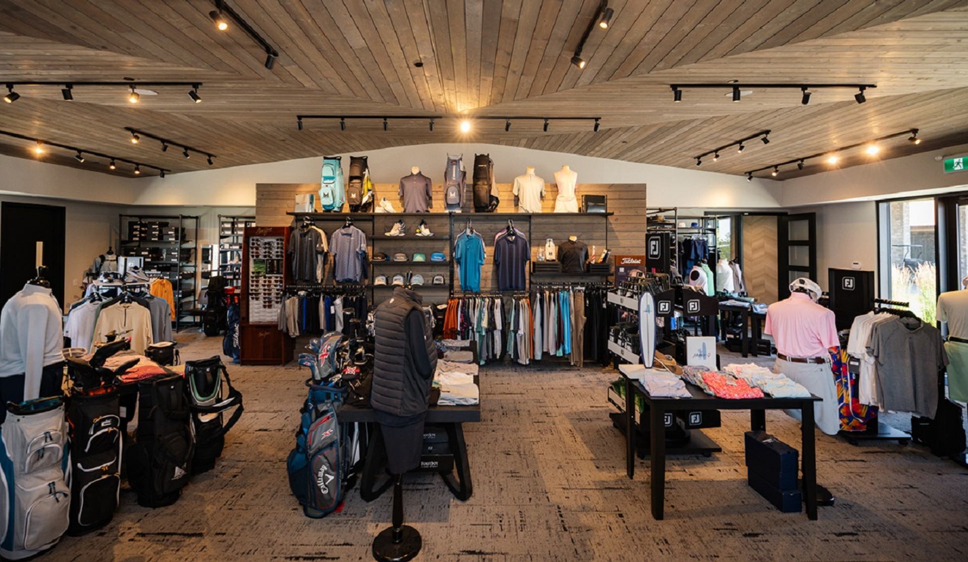 Golf pro shop at Mickelson National Golf Club with apparel, gear, and accessories.