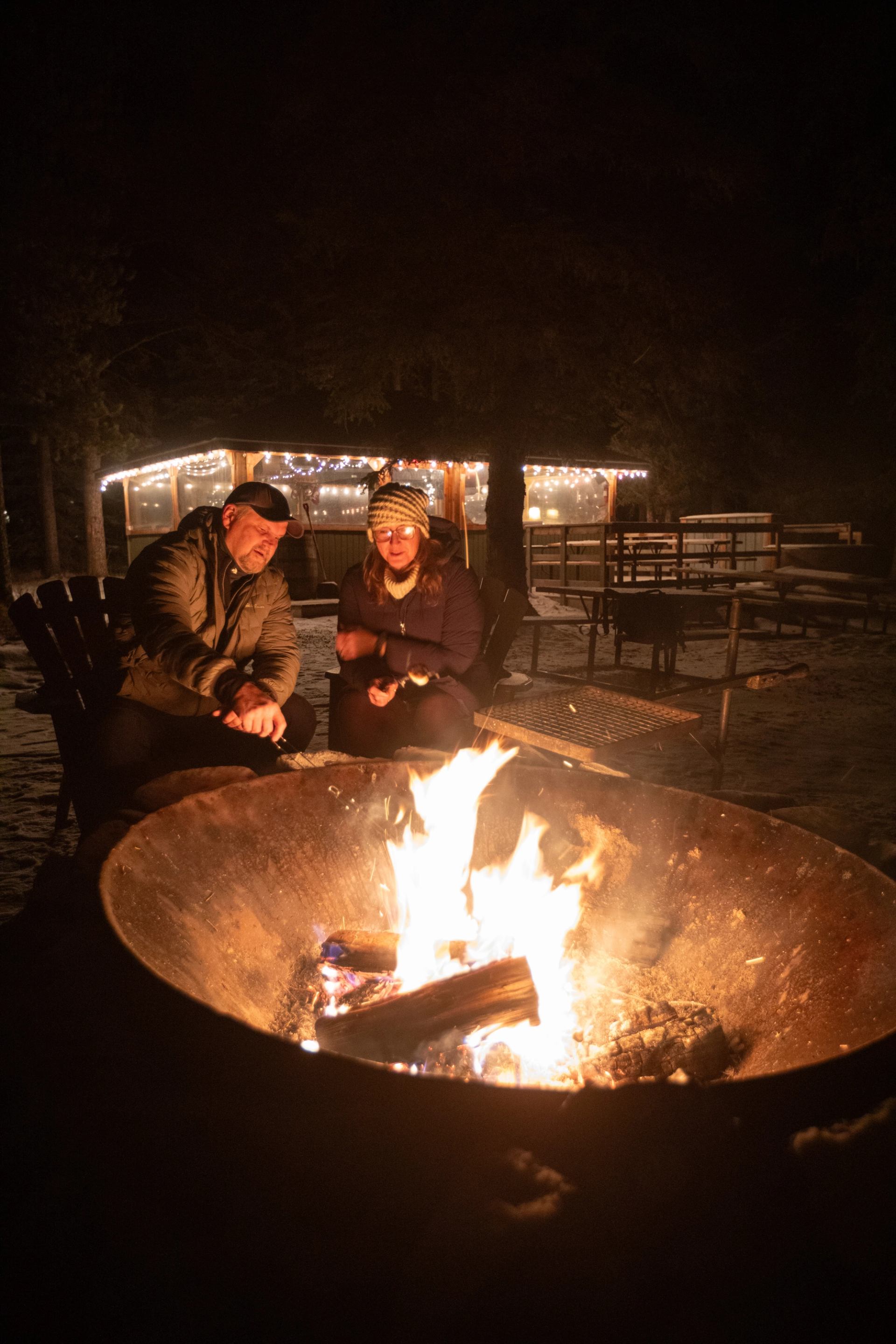 End the day around the campfire, sharing stories beneath the stars in the heart of Alberta's West Co