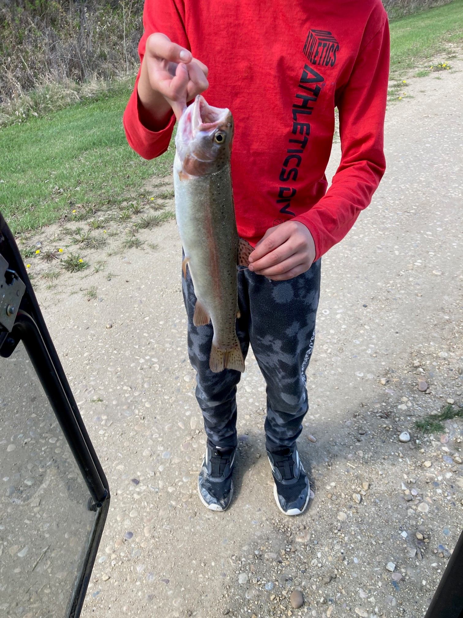 A person holding their catch.