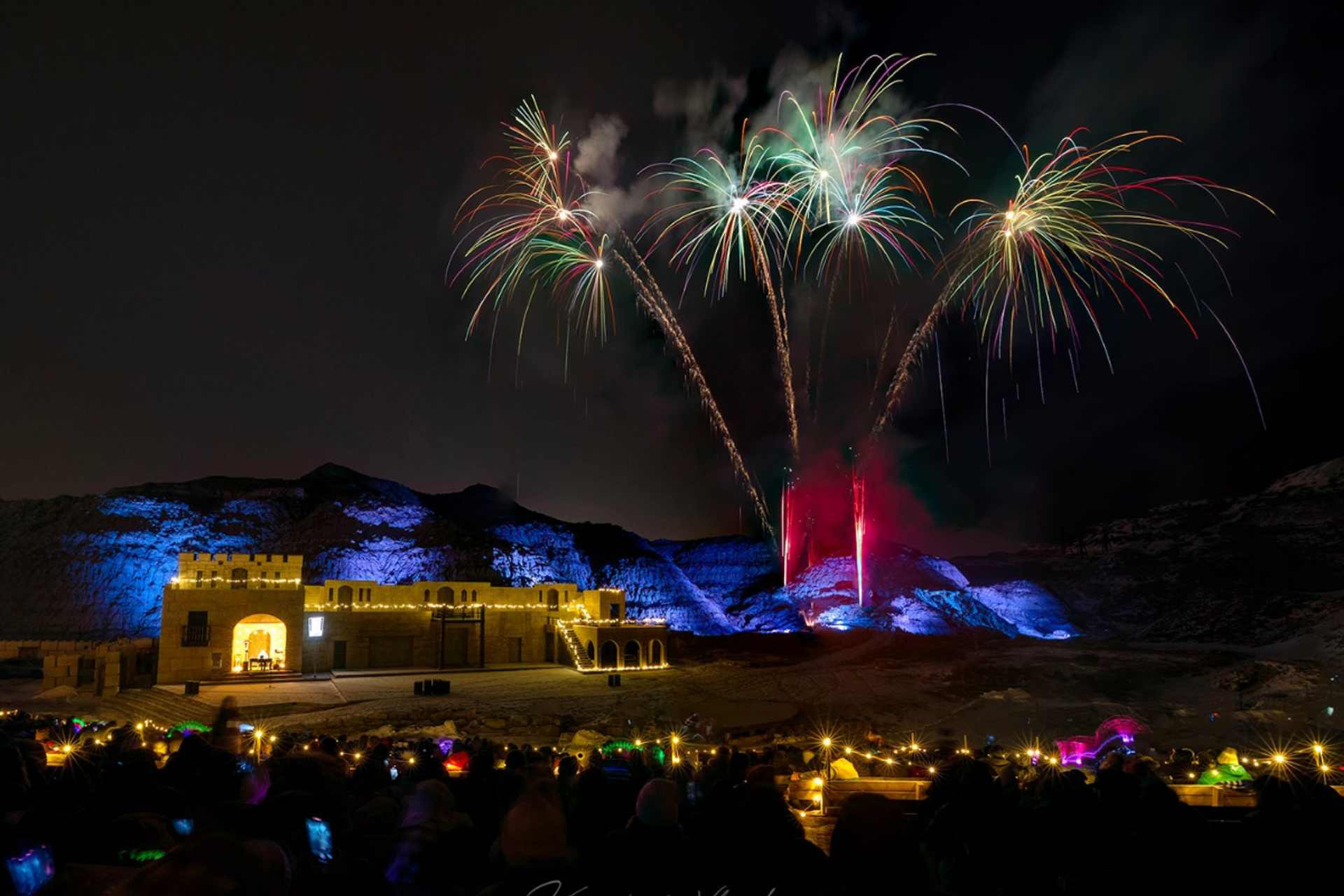 Green and white fireworks above the stage of the Badlands Amphitheatre
