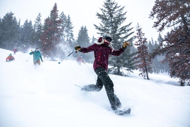 People on heli snowshoe tour