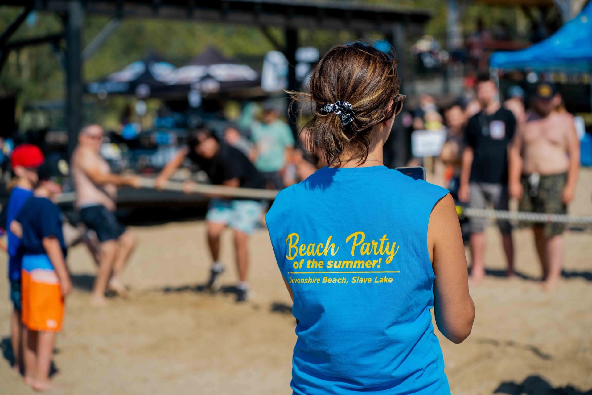 One of the many incredible volunteers watching the newest event Tug Of War competition.