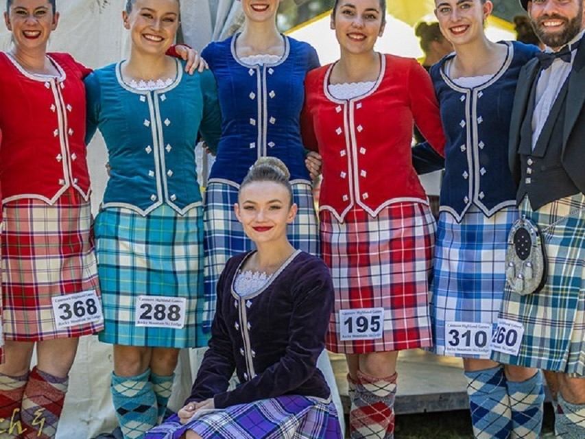 A group of people in costume for the Highland Games