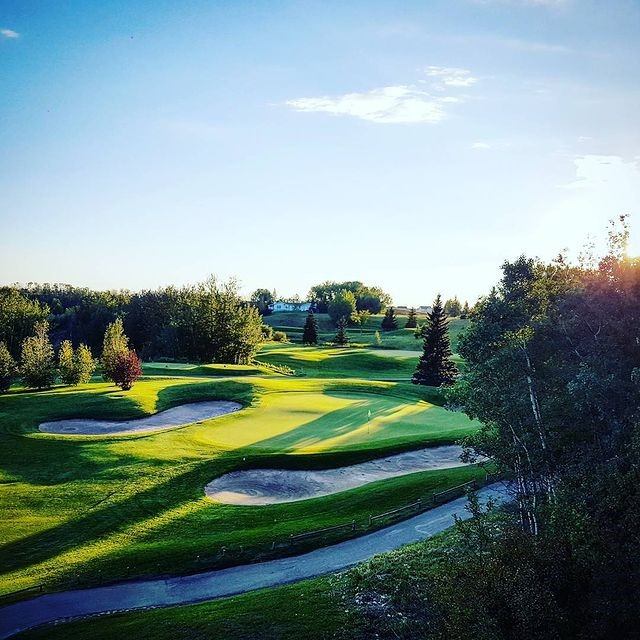 Scenic golf course with fairways, bunkers, and tree-lined paths at Jagare Ridge.