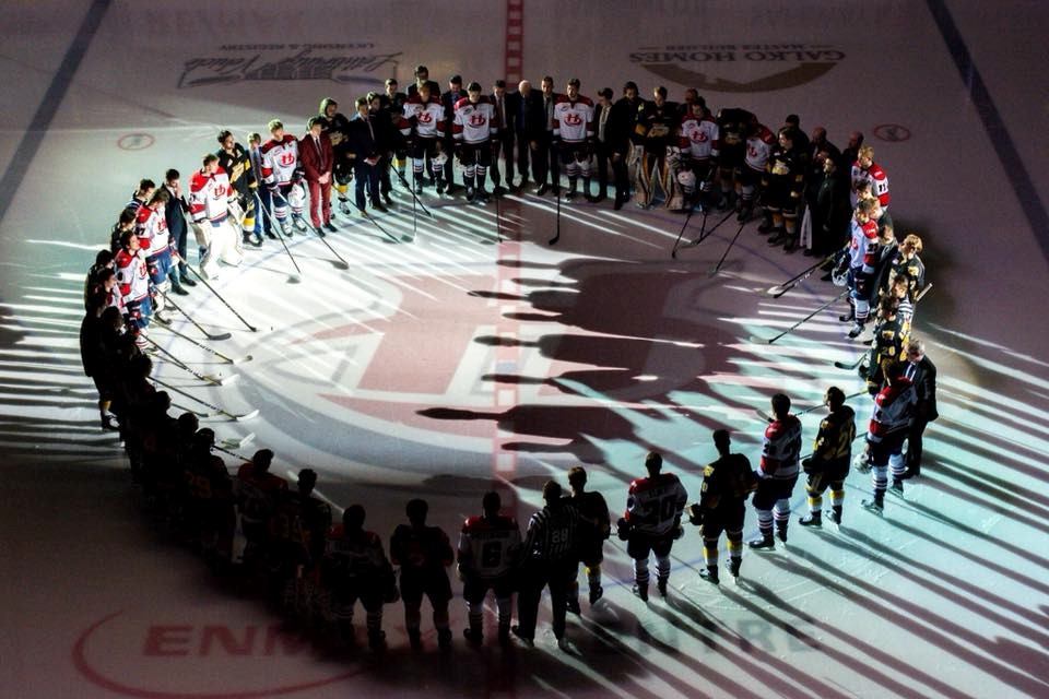 Lethbridge Hurricanes and circled on the ice before the game