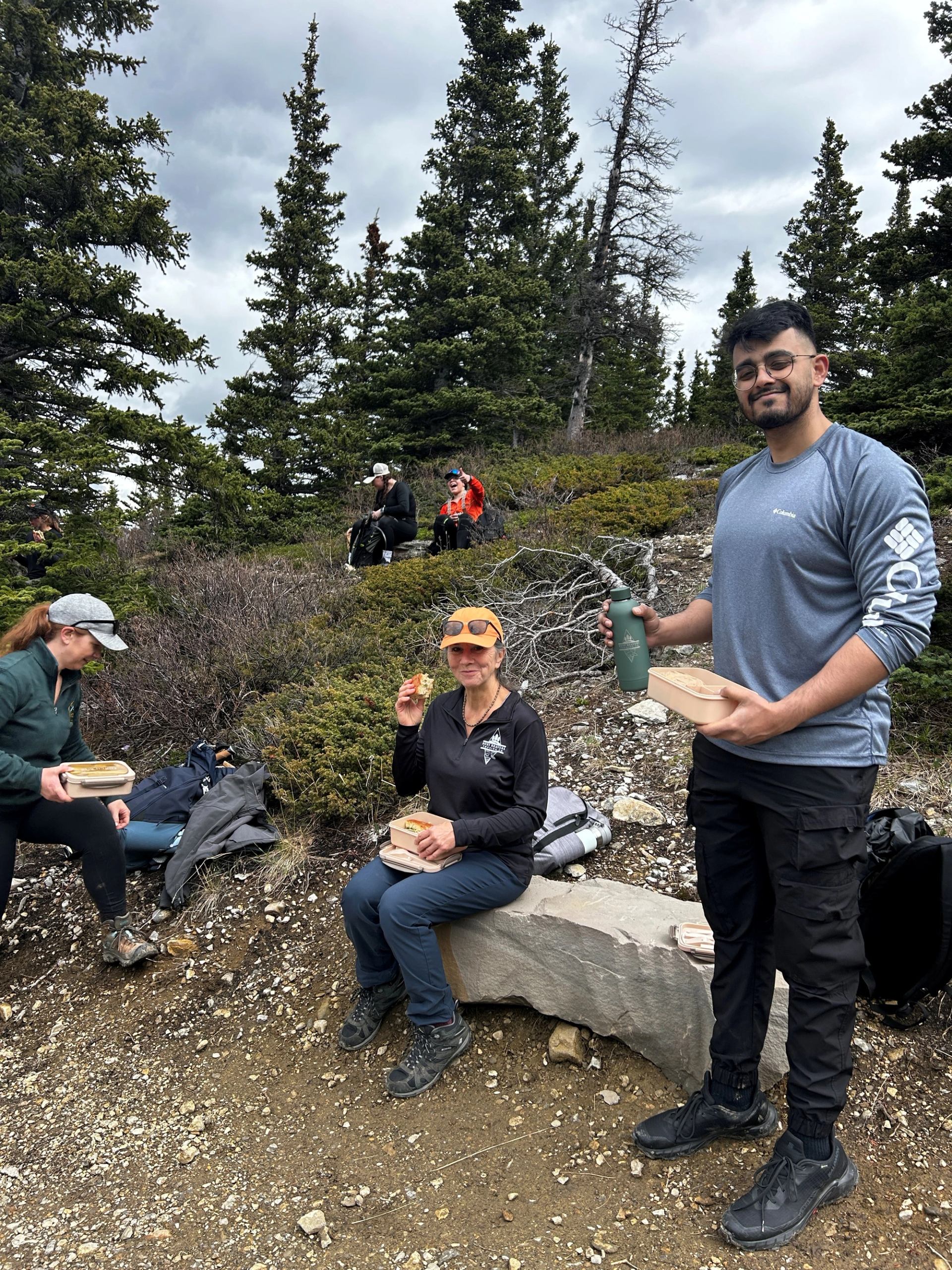 A group of people stopped having a snack.
