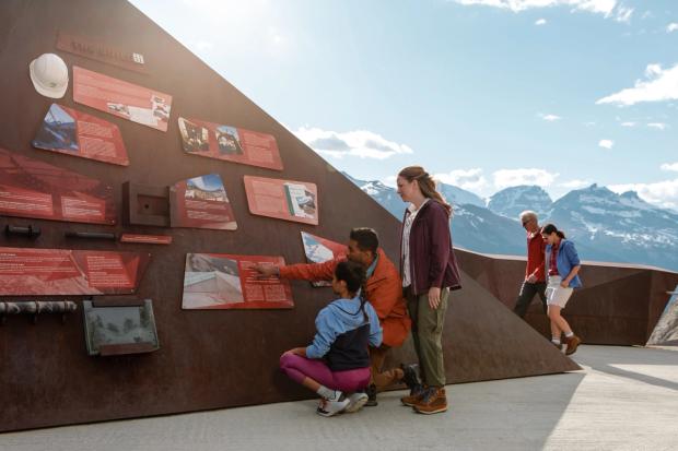 Family at the Columbia Icefield Skywalk interpretation centre.