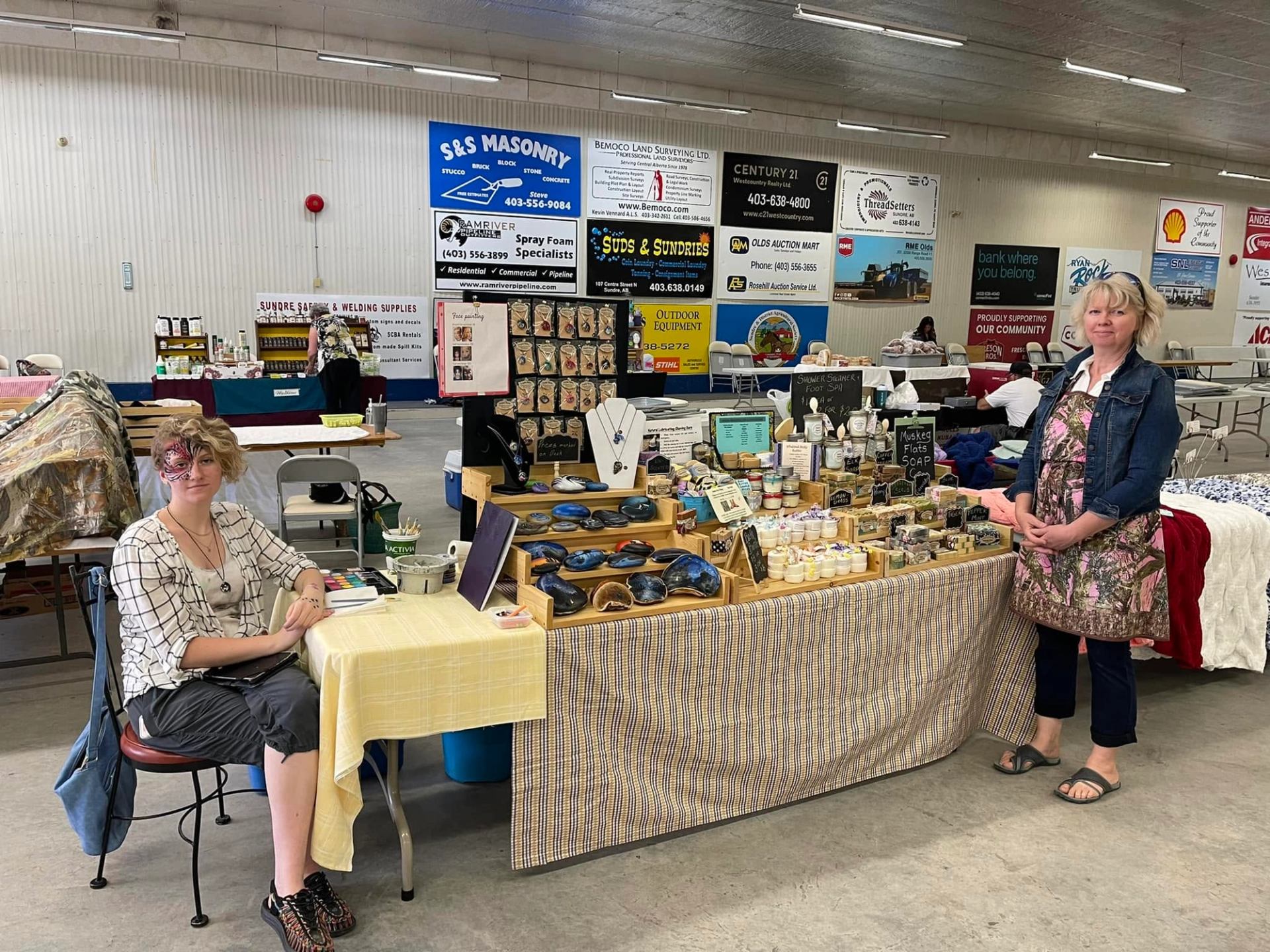 Sundre Farmers' Market showcases a vendor display with handcrafted goods and local products.