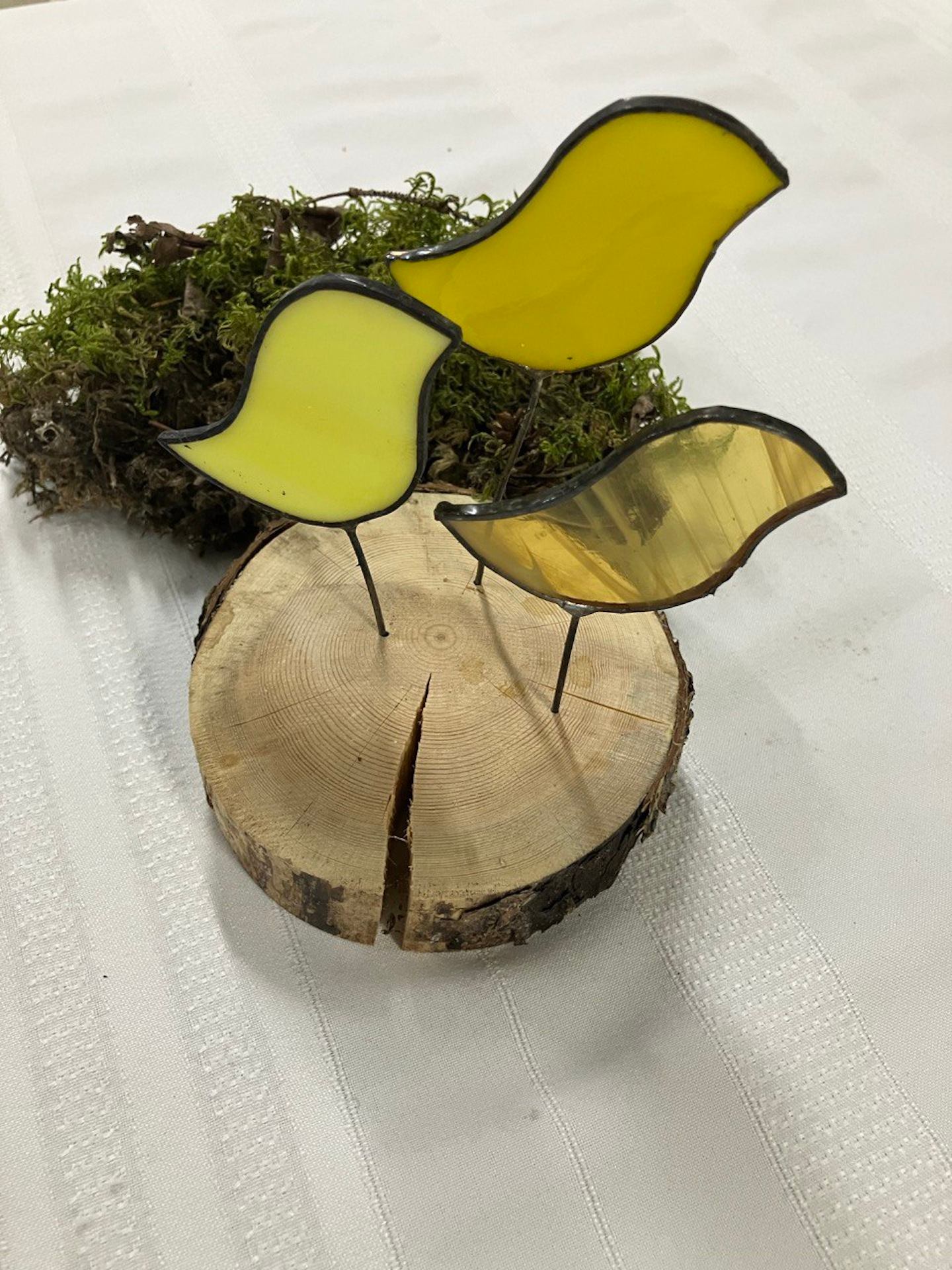 Three stained glass birds