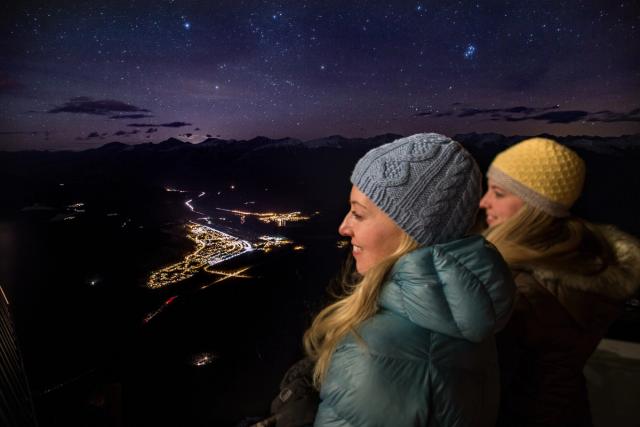 Visitors looking down at the town of Jasper from the top of the Jasper SkyTram