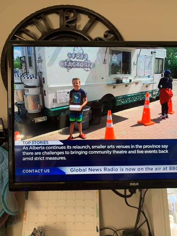 Food truck scene with people near "Cool Cones" and traffic cones.