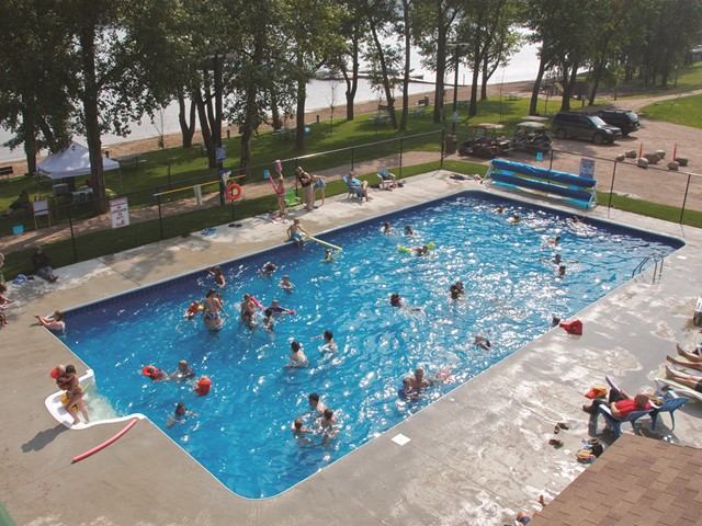 People swimming in the outdoor pool