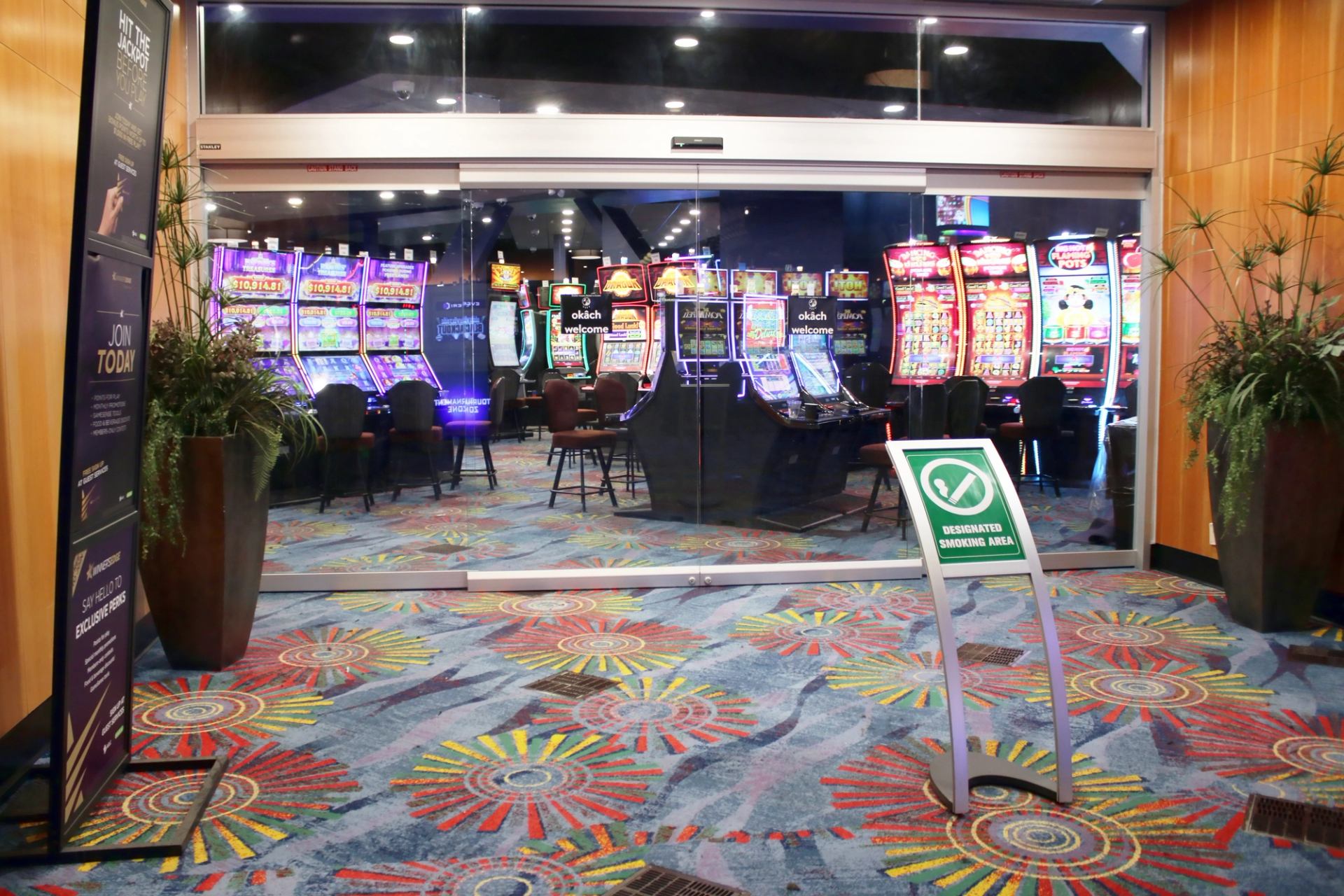 Colorful carpeted entry to gaming area.