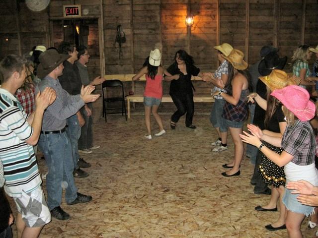 People dancing in Windy Rafters Barn