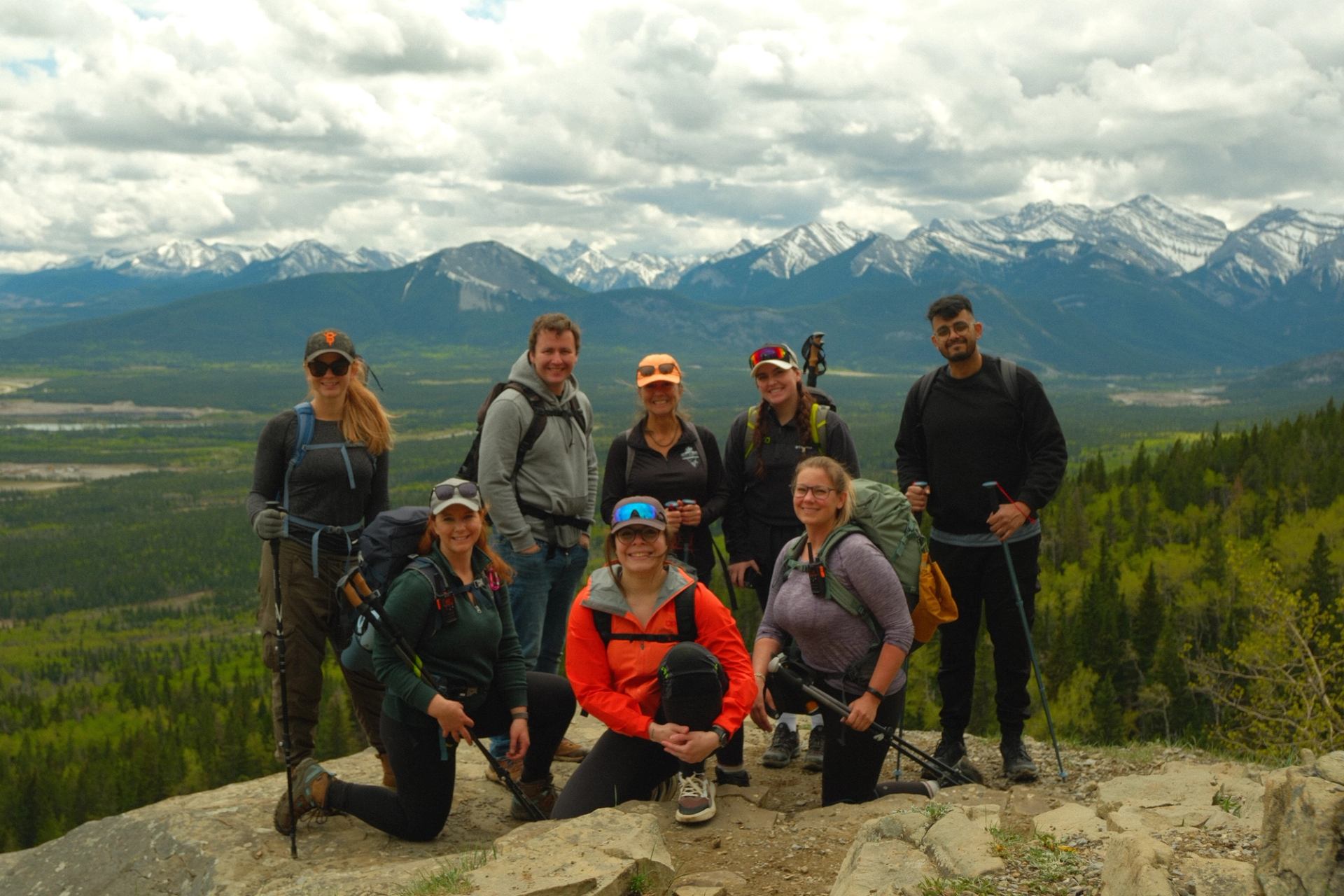 A group of people on Mount Yamnuska.