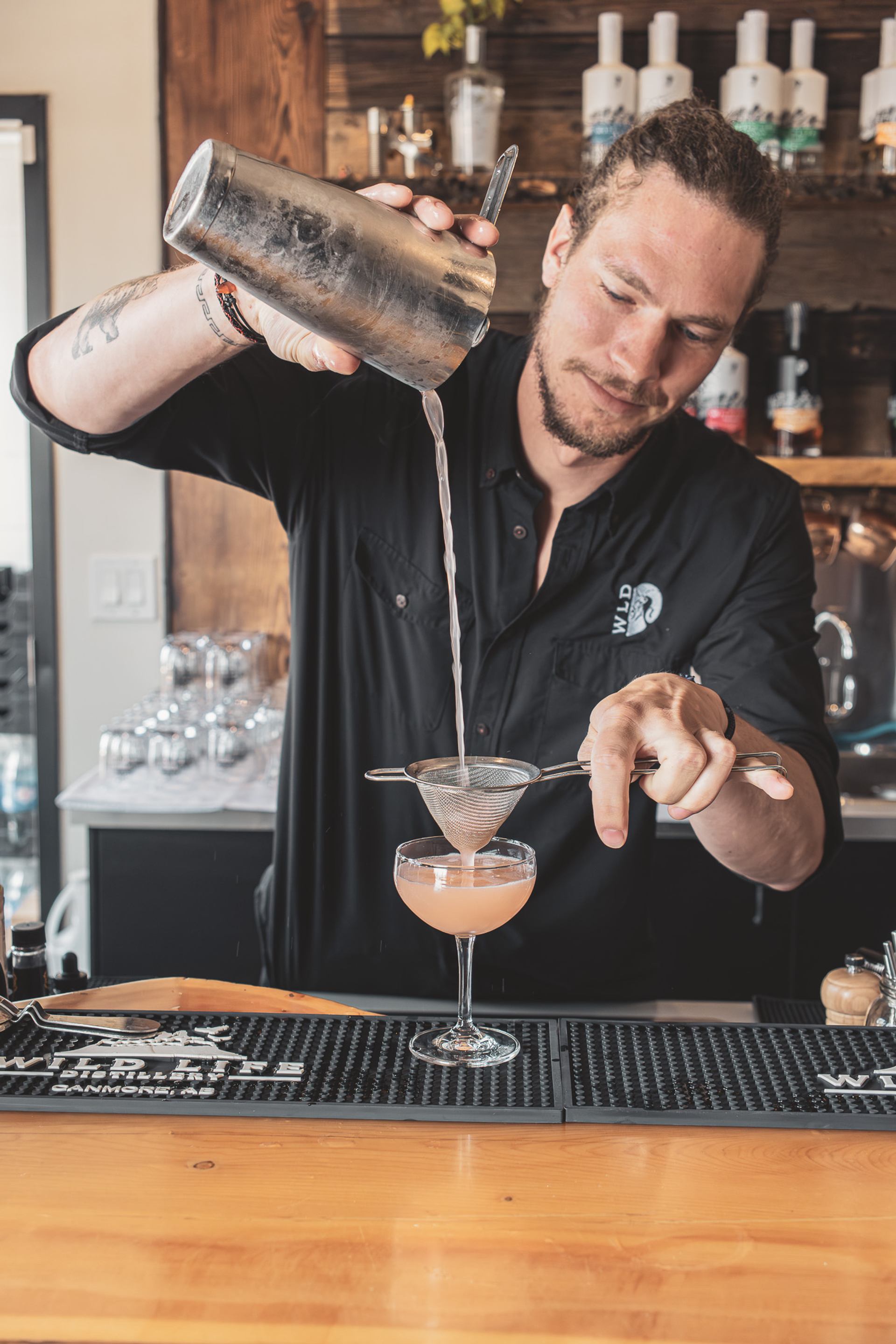 Wild Life Distillery Mixologist preparing a delicious craft cocktail