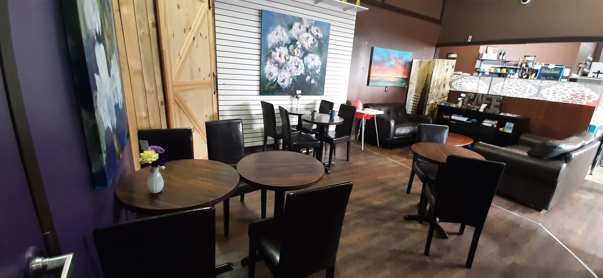 Interior tables and chairs at Leduc Coffee Shop