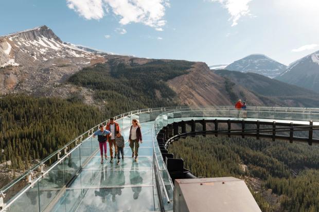 Family walking on the Columbia Icefield Skywalk.