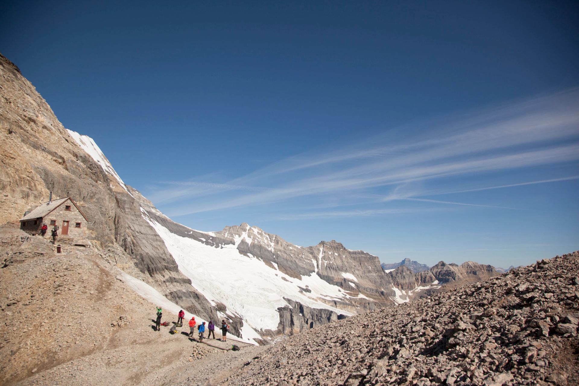 Group of people Hiking by Abbots Pass Hut in Banff National Park