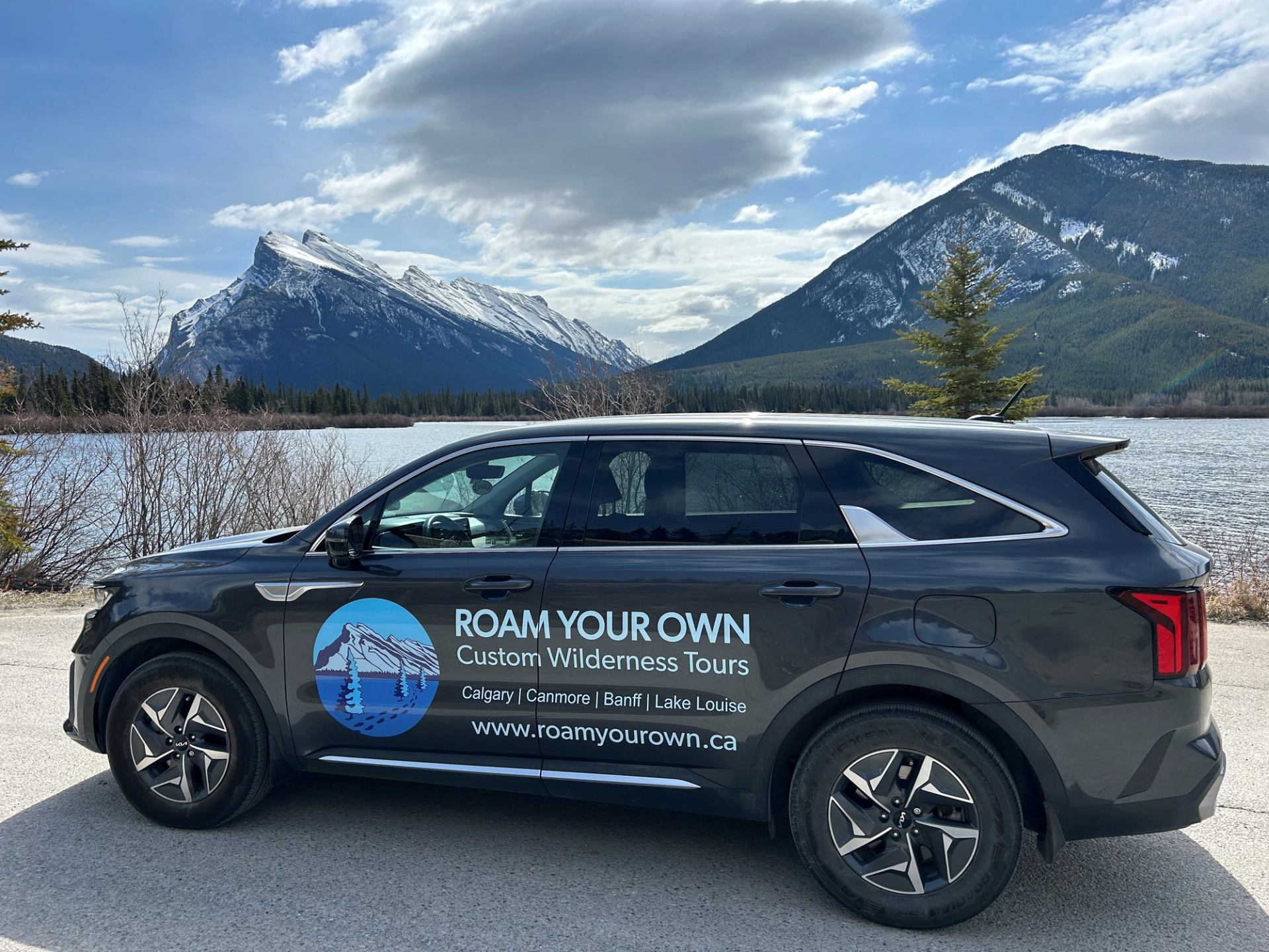 vehicle in front of a mountain