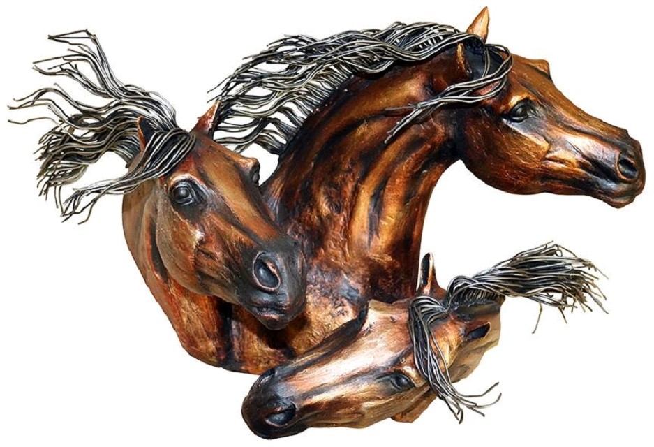 Metal horse sculpture with wire mane and decorative reins on a white background.