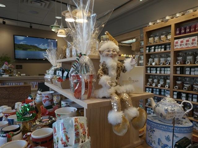 Holiday tea display with festive decor at Canmore Tea Company.
