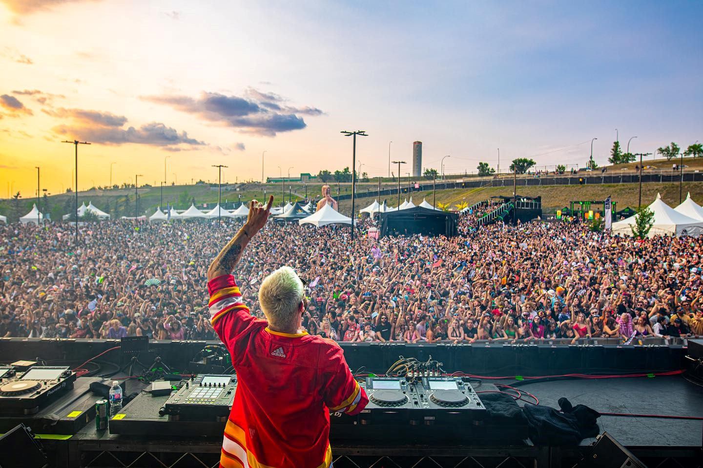 A Dj playing for the concert goers
