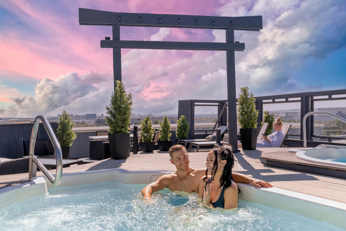 Two people enjoying the hot tub