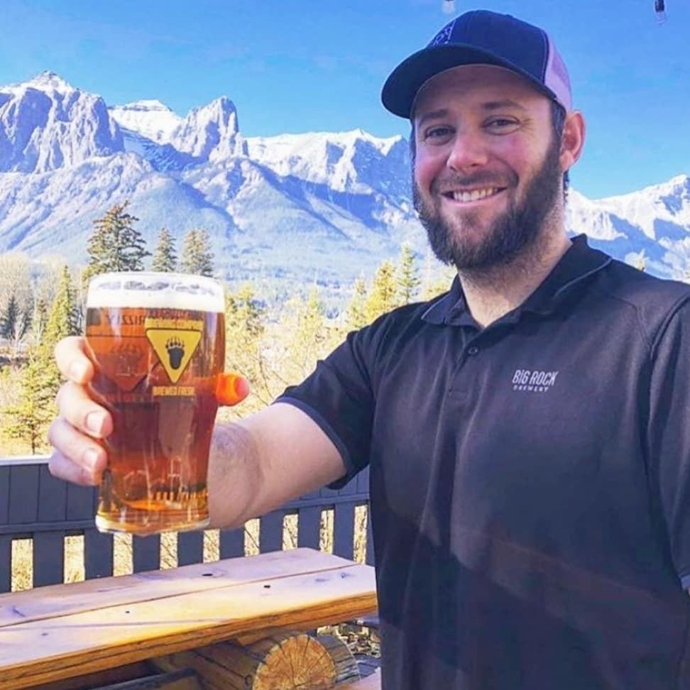 Beer in hand with mountain views at Canmore Rose & Crown.