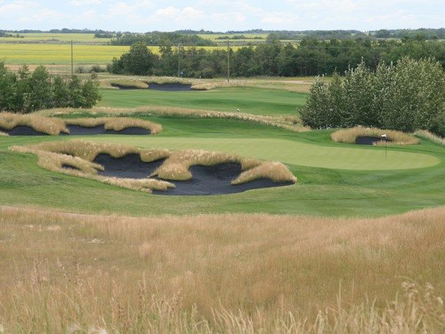 Blacksand traps on the course at Coal Creek Golf Resort.