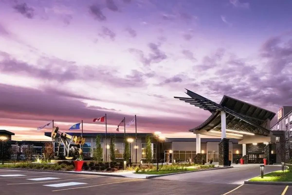 Exterior of Best Western Plus Edmonton Airport Hotel at night.
