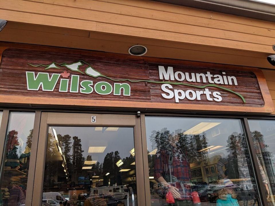Wilson Mountain Sports storefront with mountain-themed signage and glass entrance.