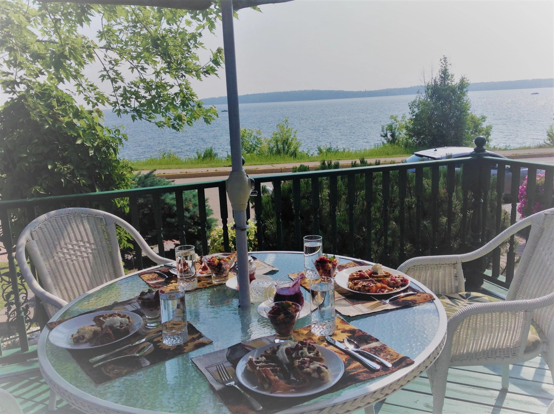 Breakfast by the lake with a stunning view, fresh waffles, and good company.