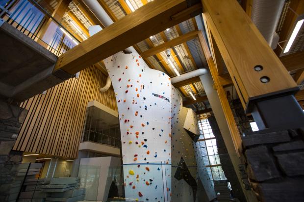 Interior shot of the rock climbing wall at Elevation Place.