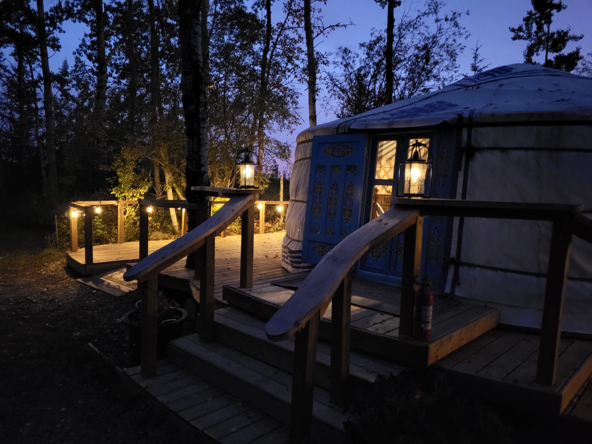 Exterior of yurt with solar powered lights