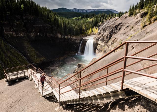 Person looking out at lookout point at Ram Falls.